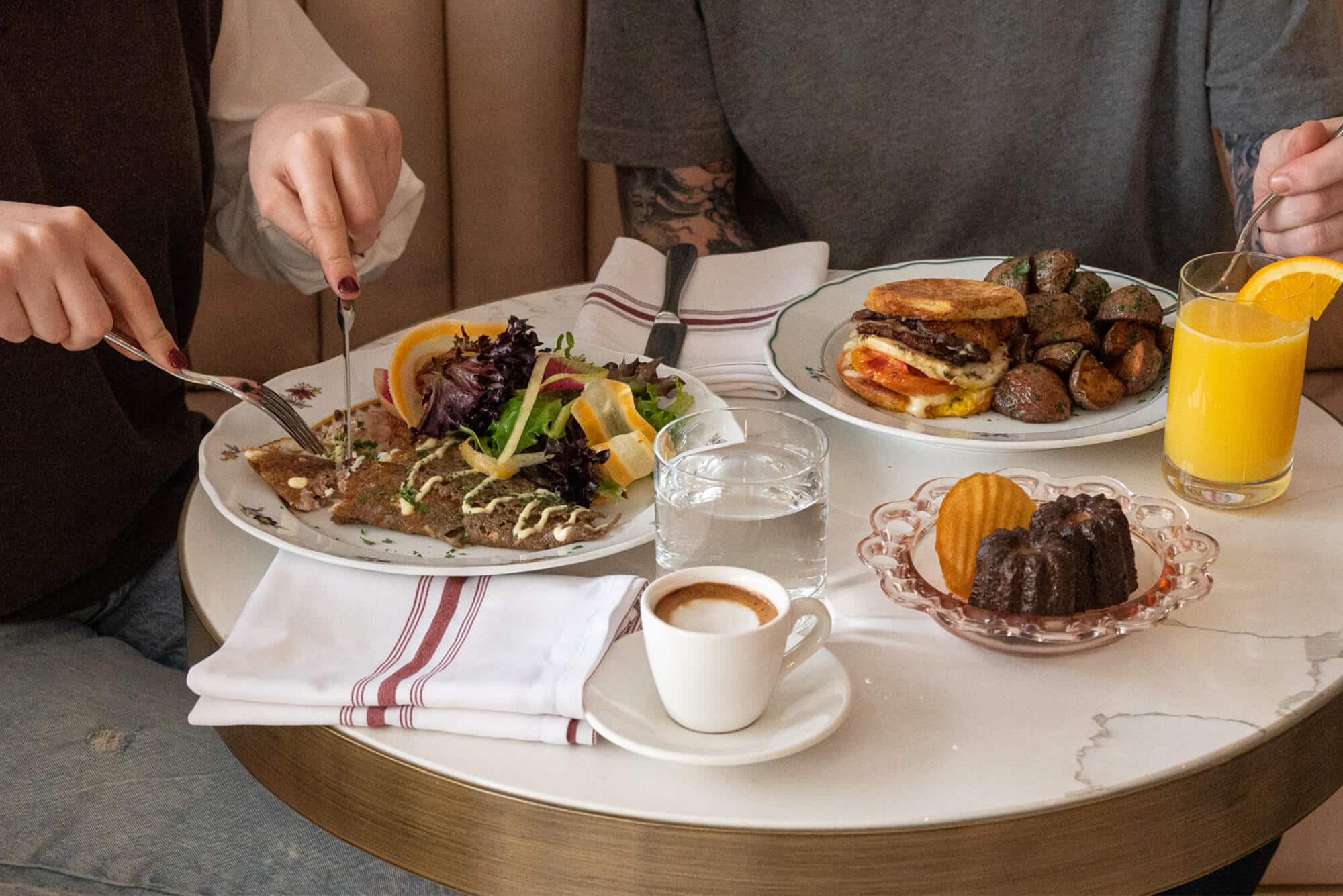 Two guests eating brunch at Cafe Lunette in Halifax
