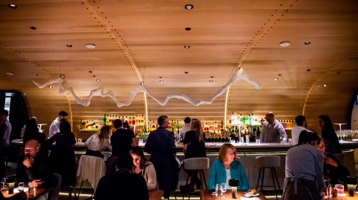 Guests sitting at the Drift bar