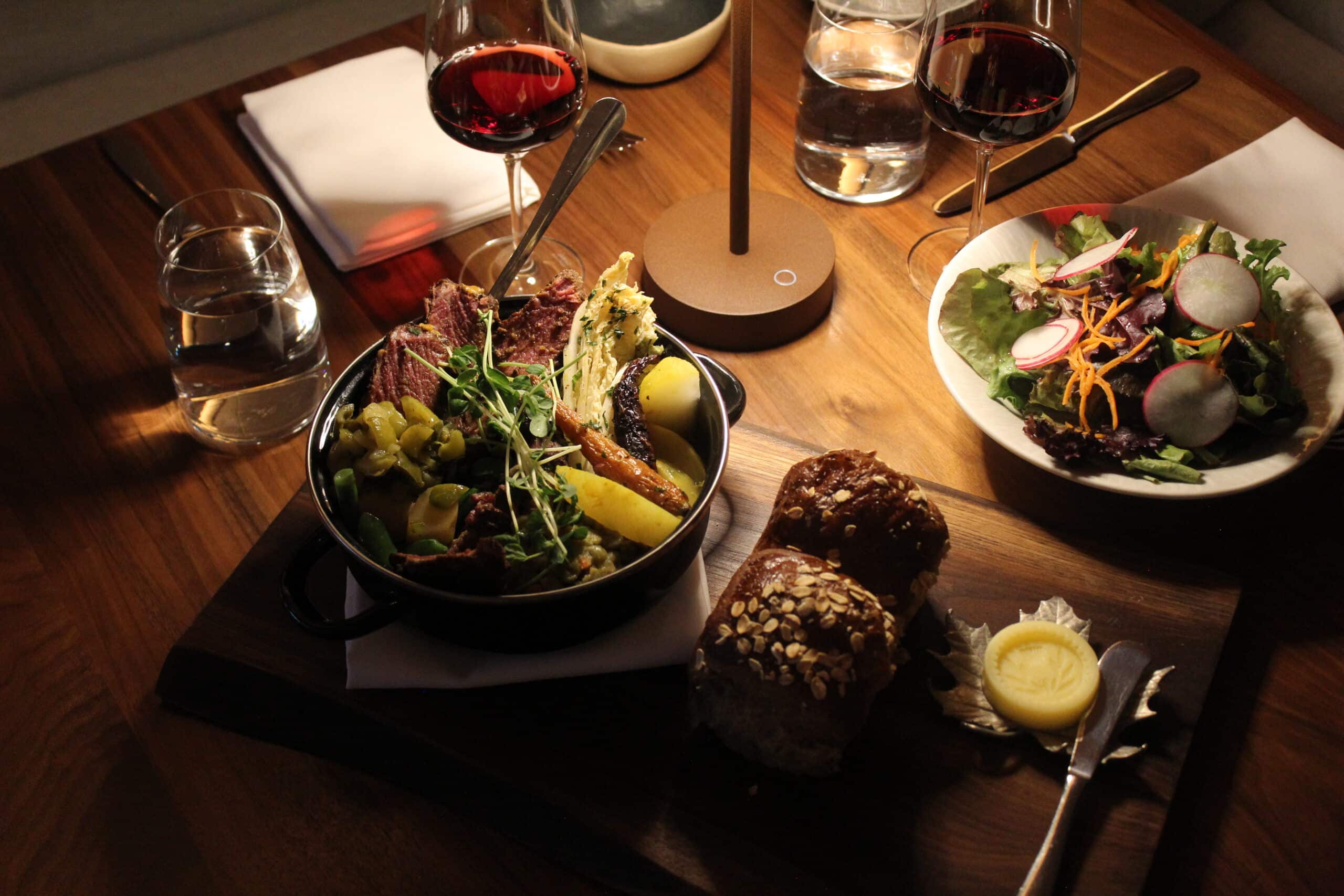 winter warm up meal under a small table light at drift